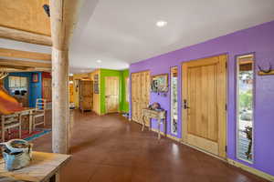Entryway featuring recessed lighting and plenty of natural light