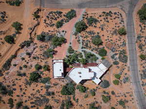 Aerial view of property and surrounding area featuring a desert landscape and rural landscape