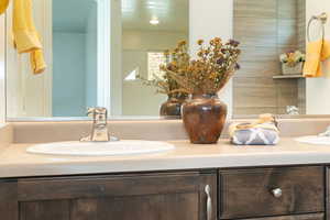 Bathroom featuring double vanity