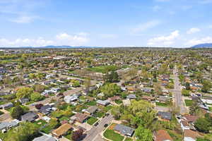 Aerial view of residential area featuring mountains
