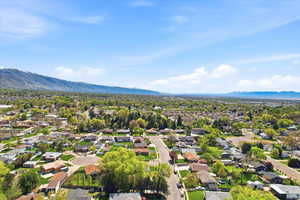 Aerial perspective of suburban area featuring mountains