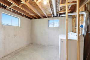 Basement featuring washing machine and dryer