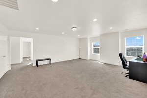 Unfurnished office featuring recessed lighting and light colored carpet