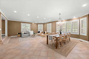 Dining room with Living Area, plenty of windows.
