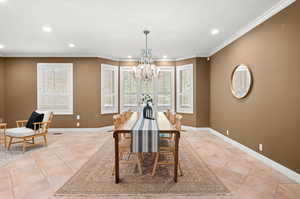Dining room and suspended large chandelier.