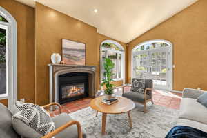 Family Room, Fireplace, and patio doors.