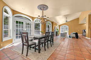 Large kitchen dining area with patio doors.