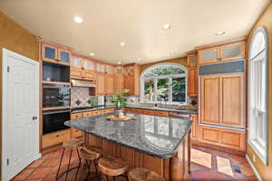 Kitchen large island and up to the counter seating.