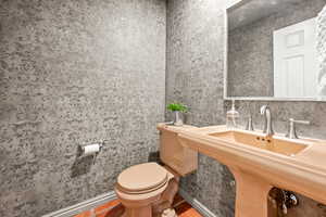 1/2 Bath off Family Room and Office.