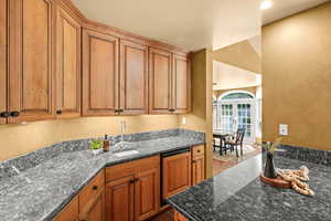 Wet Bar off the Family Room and Theater Area.
