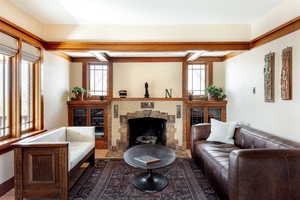 Living area featuring a fireplace and wood finished floors
