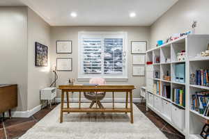 Home office featuring recessed lighting