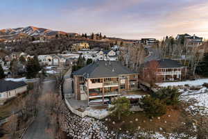 Snowy aerial view with a residential view