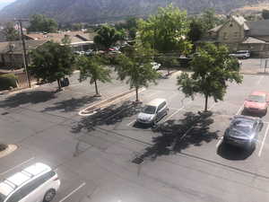 Aerial perspective of suburban area with a mountainous background