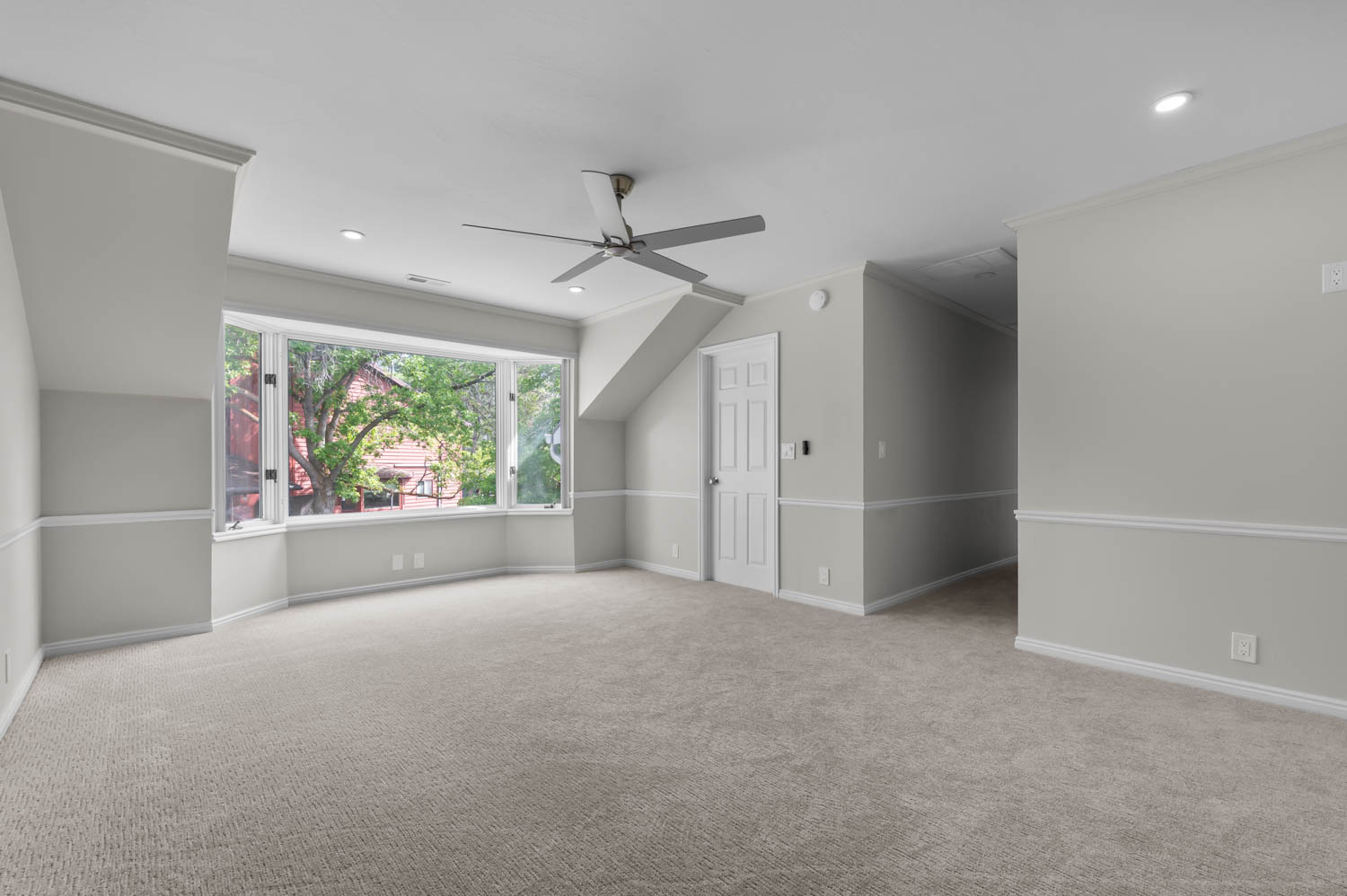 Bonus room with recessed lighting, a ceiling fan, light carpet, and lofted ceiling