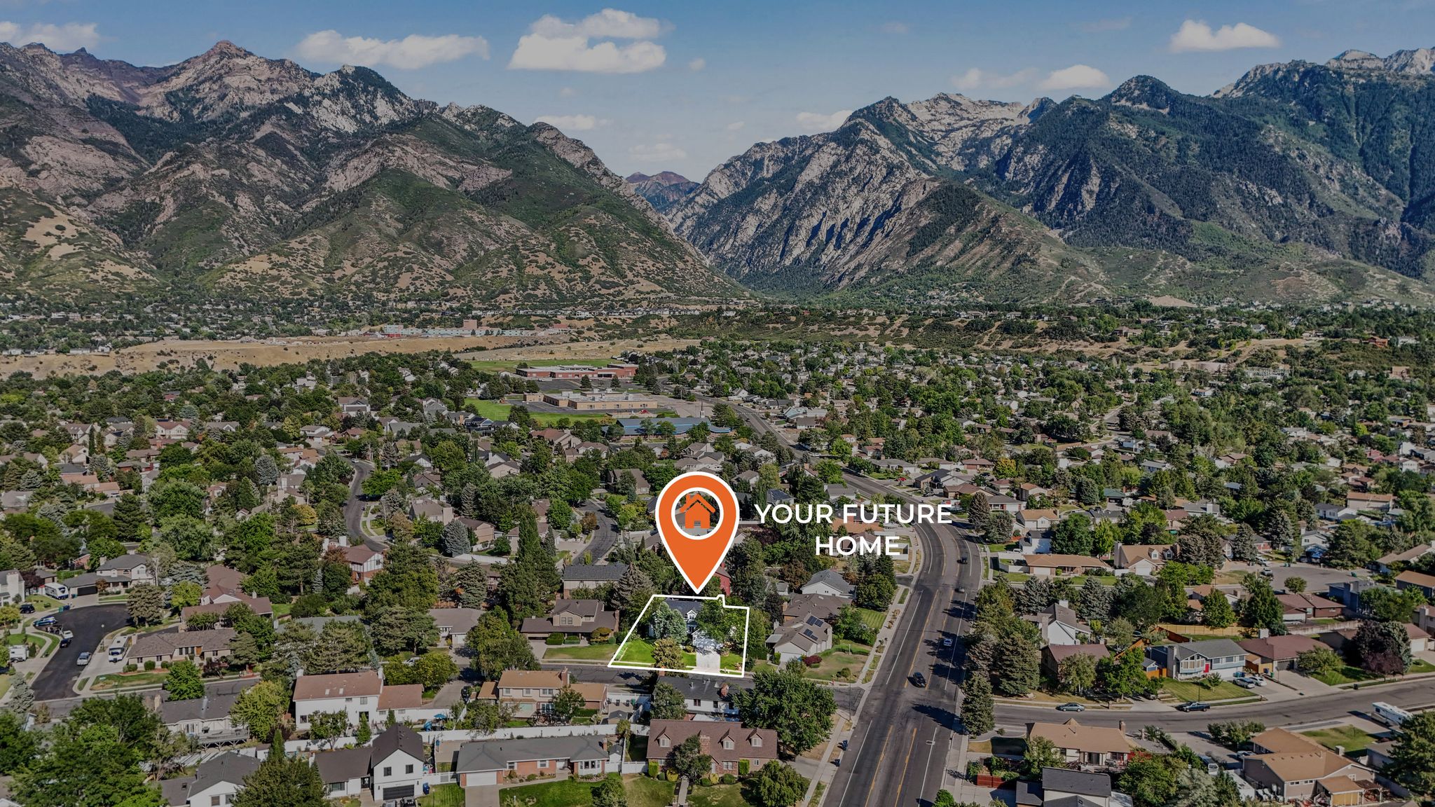 Aerial perspective of suburban area with mountains