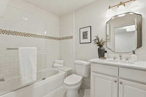 Bathroom featuring vanity and shower / bath combination