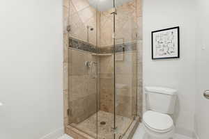 Full bath featuring a stall shower