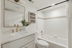 Full bathroom featuring vanity and shower / tub combo