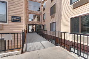 View of wooden balcony featuring a deck