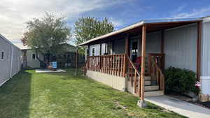 View of yard featuring wood deck