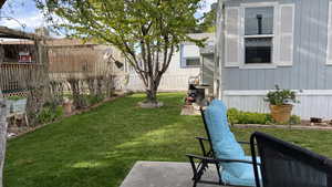 View of fenced backyard