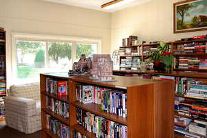 Library room with lots of books & magazines
