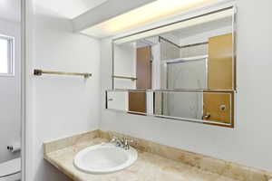 Bathroom featuring toilet and vanity