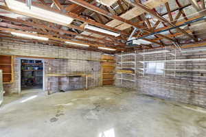 Garage featuring a garage door opener