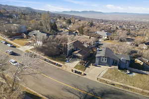 View of property location featuring a mountainous background and nearby suburban area