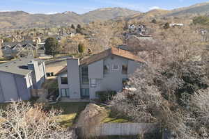 Aerial view of residential area with mountains