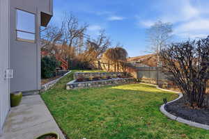 View of fenced backyard