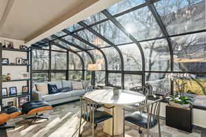 Sunroom / solarium with outdoor lounge area
