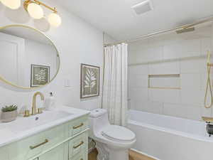 Bathroom with vanity and shower / bath combo