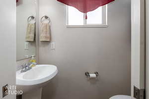 Half bath featuring toilet