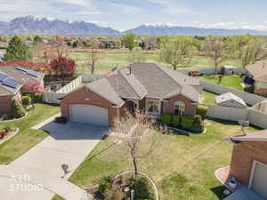 Aerial perspective of suburban area with a mountain backdrop