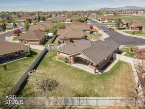 Aerial view of residential area and property back yard