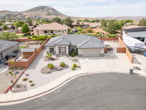 View of front of home featuring a garage, french doors, a patio area, a residential view, and concrete driveway