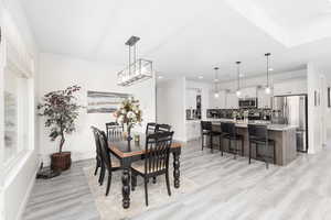 Dining room featuring light wood-type flooring