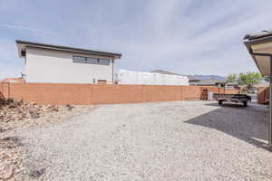 View of fenced backyard