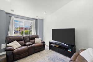 Living room with vaulted ceiling