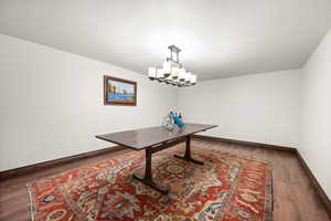 Unfurnished dining area optimal for wine cellar or theater room