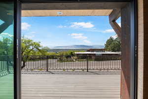 Wooden deck featuring a mountain view