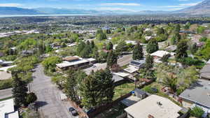 Aerial view of residential area featuring mountains