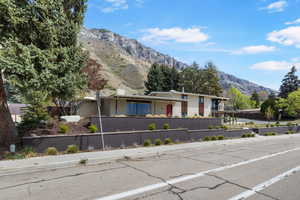 View of front of house featuring a mountain view