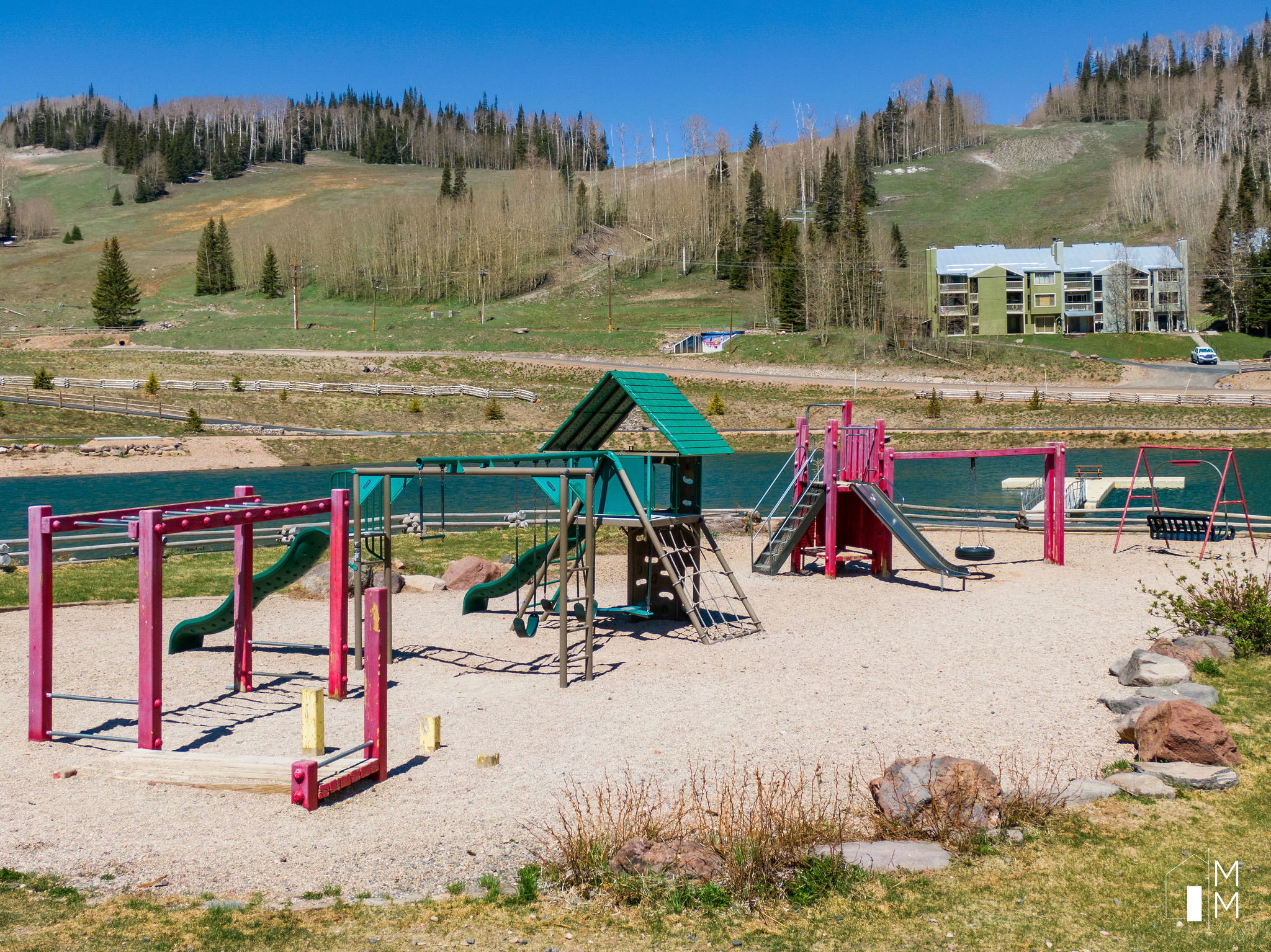 Community playground with a water view