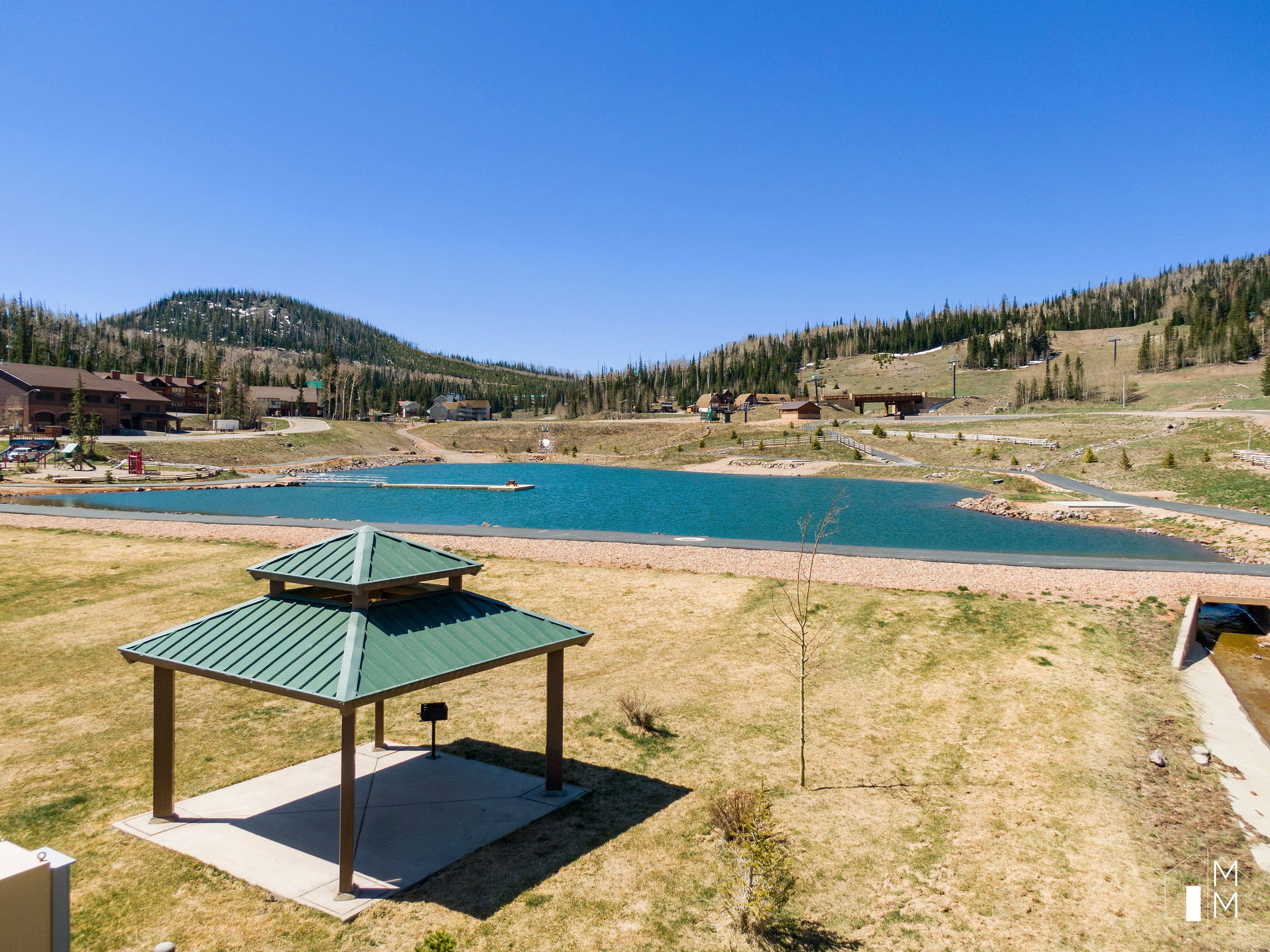 View of community featuring a patio area, a gazebo, and a water and mountain view