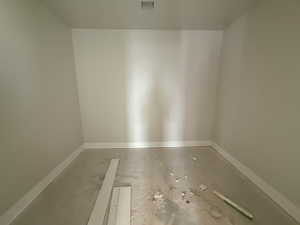 Unfurnished room with baseboards