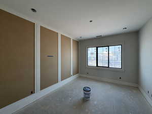 Unfurnished room featuring baseboards