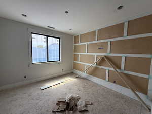 Unfurnished room featuring baseboards